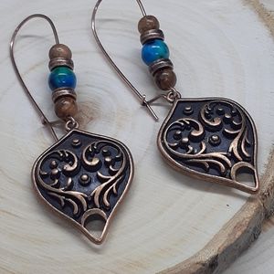 Antique copper, vintage filigree earrings with wood and turquoise accent beads.